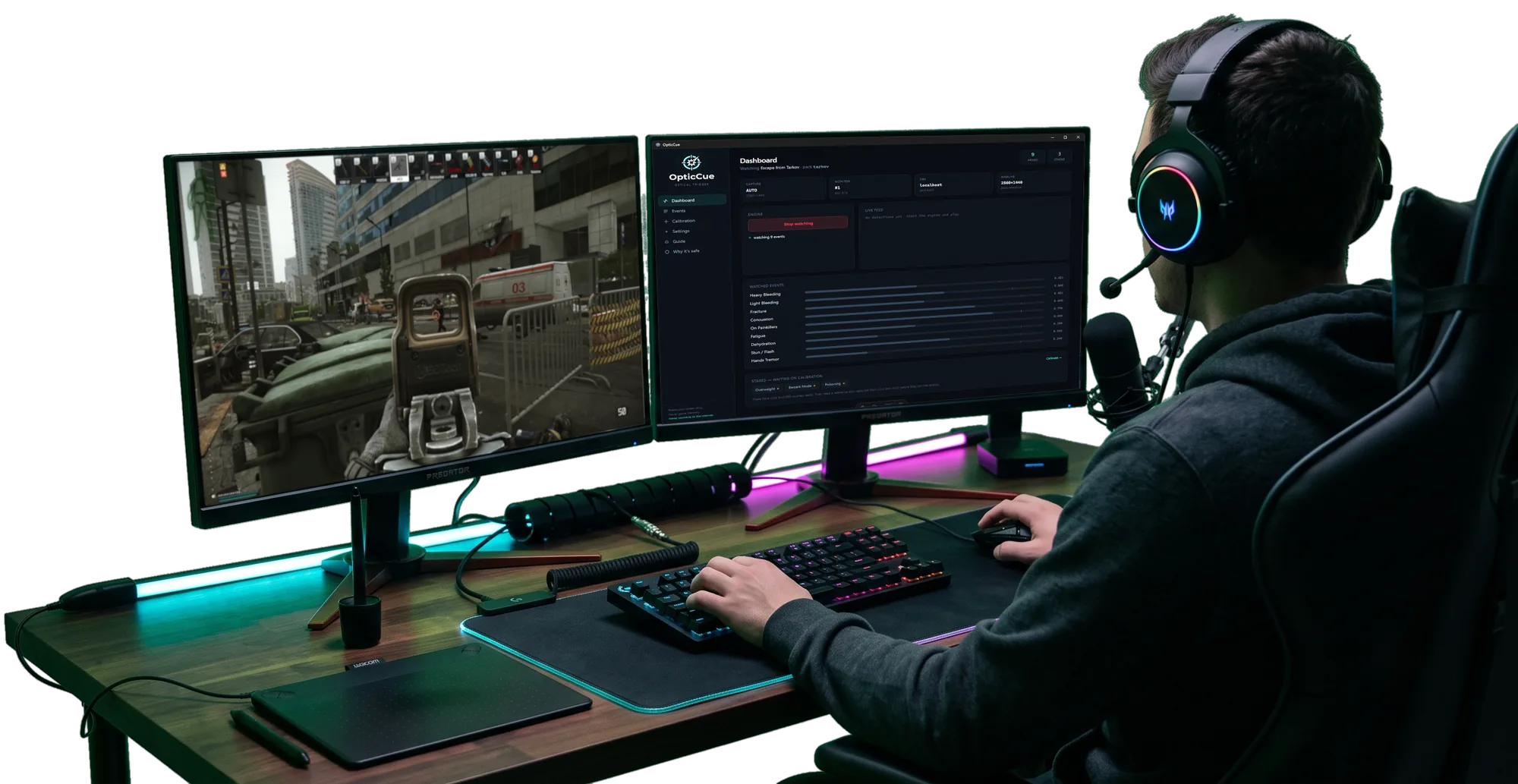 A streamer's dual-monitor battlestation — the game on one screen, the OpticCue dashboard firing overlays on the other